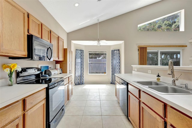1039 Eagles Forrest Dr, Apopka, FL 32712 - kitchen with black appliances, light countertops, light tile patterned floors, recessed lighting, and plenty of natural light