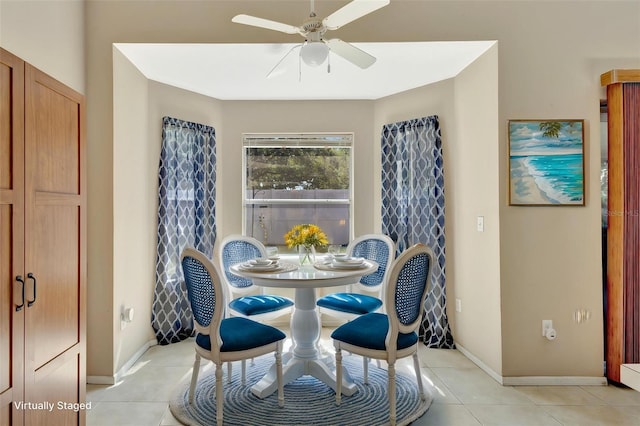 1039 Eagles Forrest Dr, Apopka, FL 32712 - dining room with light tile patterned floors and a ceiling fan