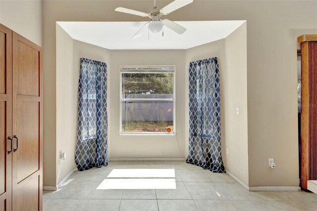 1039 Eagles Forrest Dr, Apopka, FL 32712 - spare room with a ceiling fan and light tile patterned floors