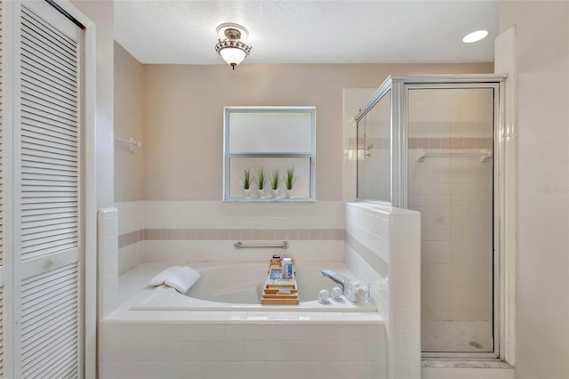 1039 Eagles Forrest Dr, Apopka, FL 32712 - full bathroom with a stall shower, a garden tub, and a closet