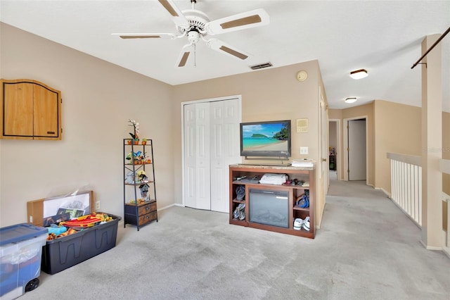 1039 Eagles Forrest Dr, Apopka, FL 32712 - sitting room with carpet and ceiling fan