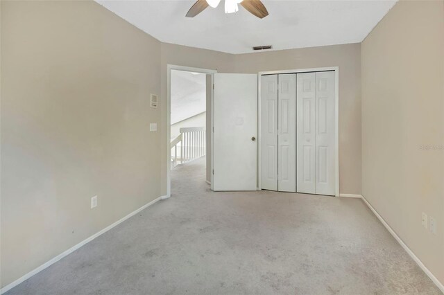 1039 Eagles Forrest Dr, Apopka, FL 32712 - unfurnished bedroom with carpet flooring, a closet, and ceiling fan