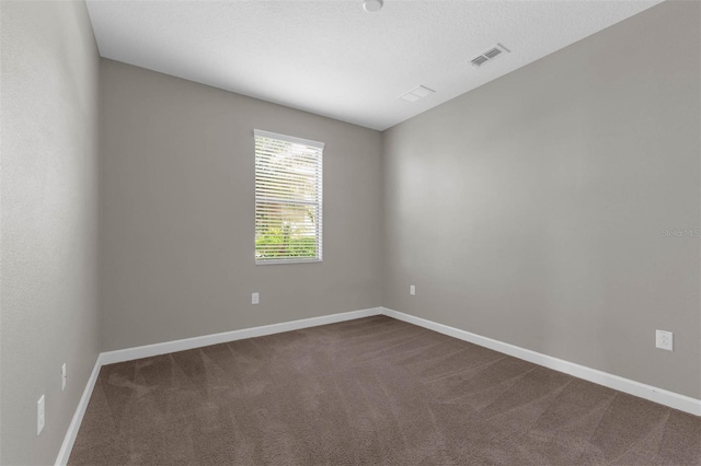 8970 Azalea Sands Ln Unit 2302, Davenport, FL 33896 - empty room featuring dark carpet and baseboards