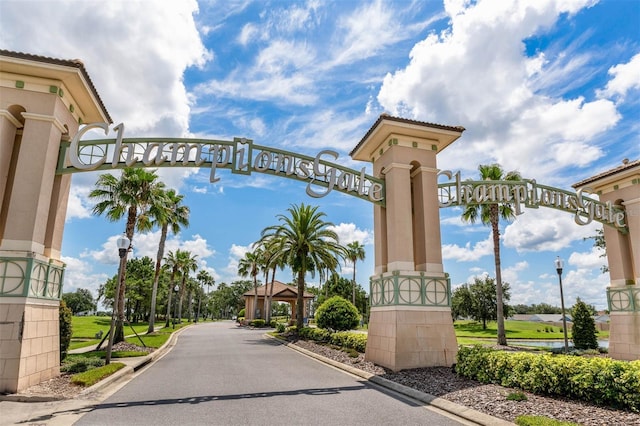 8970 Azalea Sands Ln Unit 2302, Davenport, FL 33896 - view of asphalt street featuring street lights and curbs
