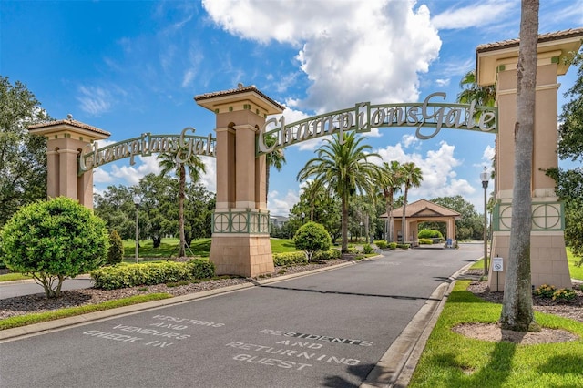 8970 Azalea Sands Ln Unit 2302, Davenport, FL 33896 - view of asphalt road featuring curbs and street lights