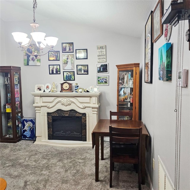 4471 Treasure Cay Rd, Tavares, FL 32778 - carpeted dining space with a chandelier, a fireplace, and lofted ceiling