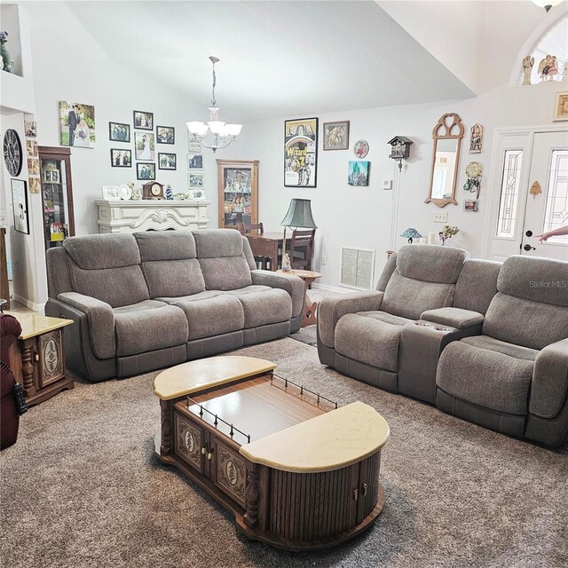 4471 Treasure Cay Rd, Tavares, FL 32778 - living room featuring a chandelier, vaulted ceiling, and carpet