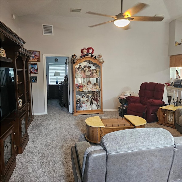 4471 Treasure Cay Rd, Tavares, FL 32778 - living area featuring a ceiling fan and carpet flooring