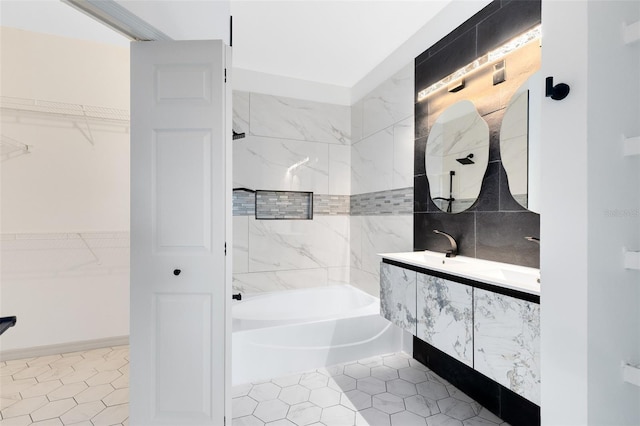 3280 Soho St Unit 306, Orlando, FL 32835 - full bath featuring tile patterned floors, bathing tub / shower combination, double vanity, and a walk in closet