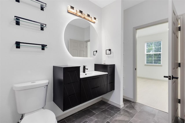 3280 Soho St Unit 306, Orlando, FL 32835 - bathroom with marble look tile flooring and vanity