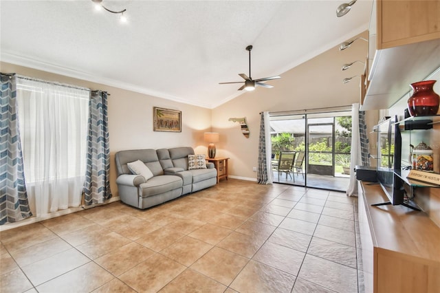 145 Lakeside Cir, Sanford, FL 32773 - living area with ceiling fan, crown molding, light tile patterned floors, and high vaulted ceiling