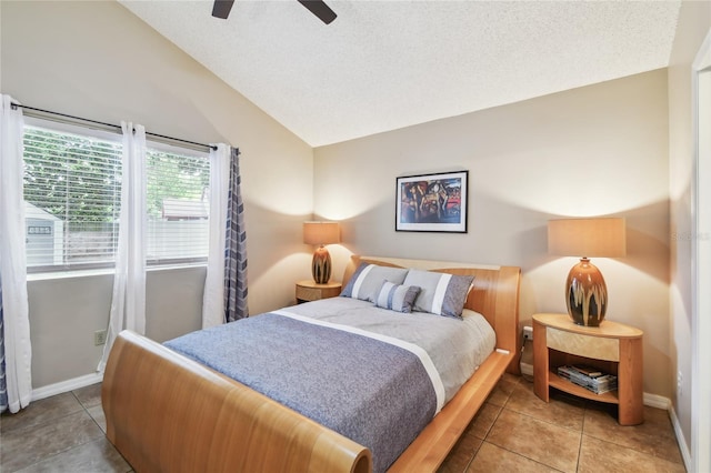 145 Lakeside Cir, Sanford, FL 32773 - bedroom featuring vaulted ceiling, tile patterned flooring, and a ceiling fan