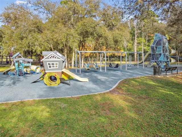 145 Lakeside Cir, Sanford, FL 32773 - communal playground with a yard and view of scattered trees