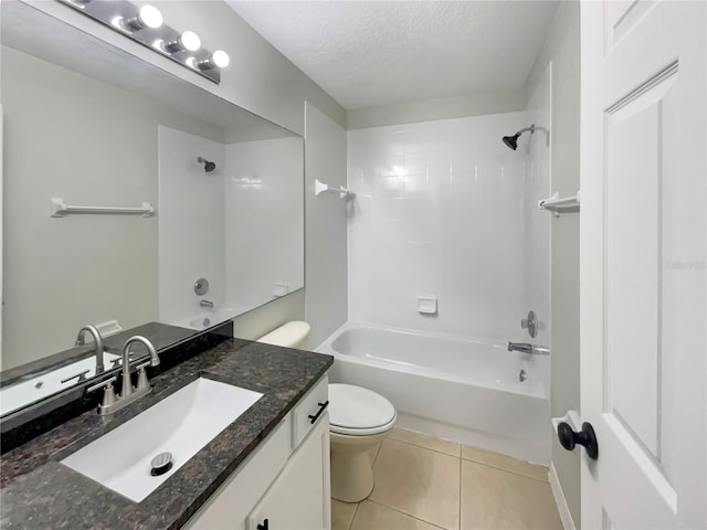 13108 Long Pine Trl, Clermont, FL 34711 - bathroom with vanity, tile patterned floors, washtub / shower combination, and a textured ceiling