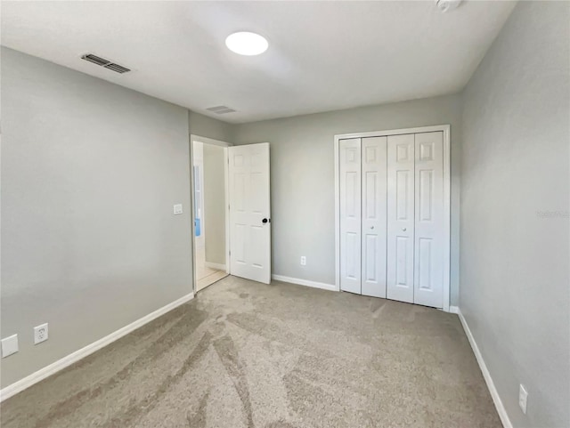 13108 Long Pine Trl, Clermont, FL 34711 - unfurnished bedroom featuring carpet and a closet
