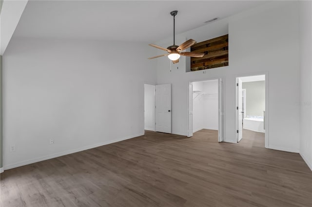 762 Lake Como Dr, Lake Mary, FL 32746 - unfurnished living room with a ceiling fan, high vaulted ceiling, and wood finished floors