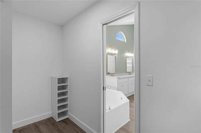 762 Lake Como Dr, Lake Mary, FL 32746 - hallway featuring wood finished floors and baseboards