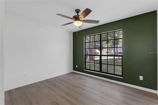 762 Lake Como Dr, Lake Mary, FL 32746 - spare room featuring wood finished floors and ceiling fan