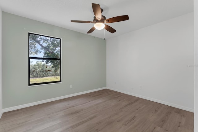 762 Lake Como Dr, Lake Mary, FL 32746 - empty room with wood finished floors and ceiling fan