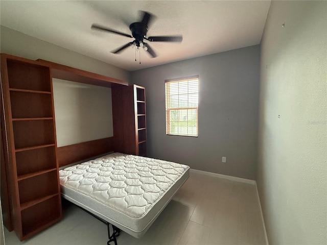 922 Suffolk Pl, Davenport, FL 33896 - bedroom with baseboards and a ceiling fan