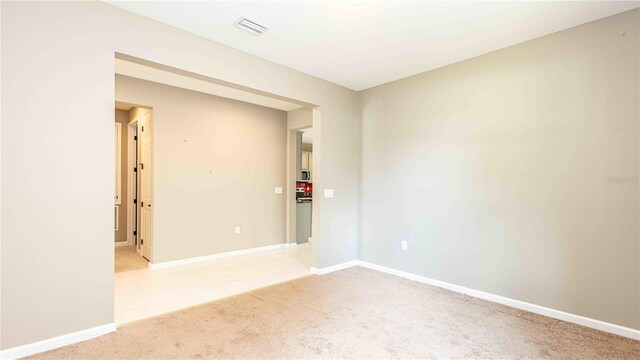 922 Suffolk Pl, Davenport, FL 33896 - empty room with light carpet and baseboards