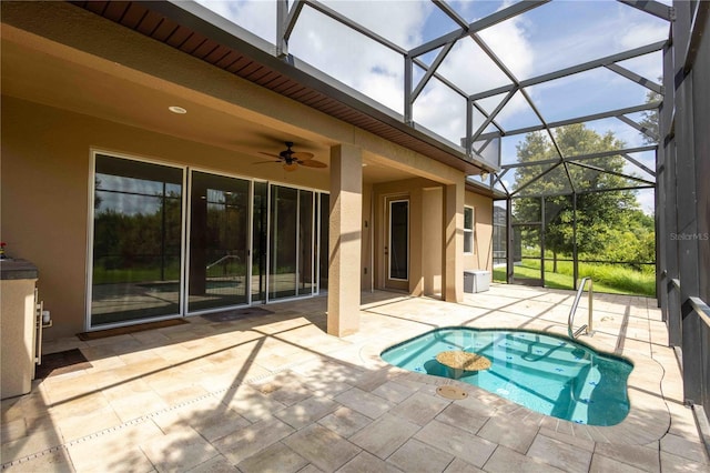 922 Suffolk Pl, Davenport, FL 33896 - outdoor pool with a patio area, a ceiling fan, and glass enclosure