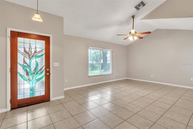 2002 Culpepper Dr, Brandon, FL 33511 - foyer entrance with ceiling fan, light tile patterned floors, and vaulted ceiling