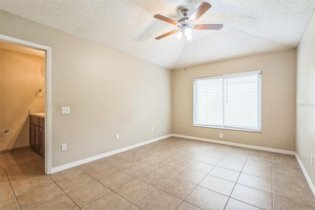 2002 Culpepper Dr, Brandon, FL 33511 - empty room with light tile patterned floors, ceiling fan, and a textured ceiling