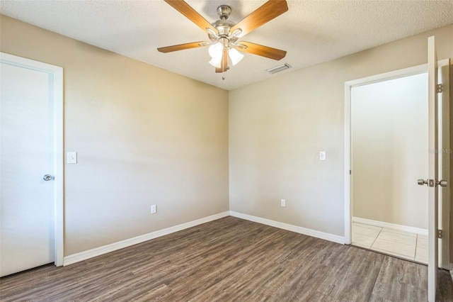 2002 Culpepper Dr, Brandon, FL 33511 - empty room with wood finished floors and ceiling fan