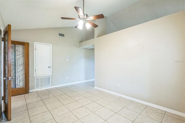 2002 Culpepper Dr, Brandon, FL 33511 - empty room featuring a ceiling fan, light tile patterned floors, and high vaulted ceiling