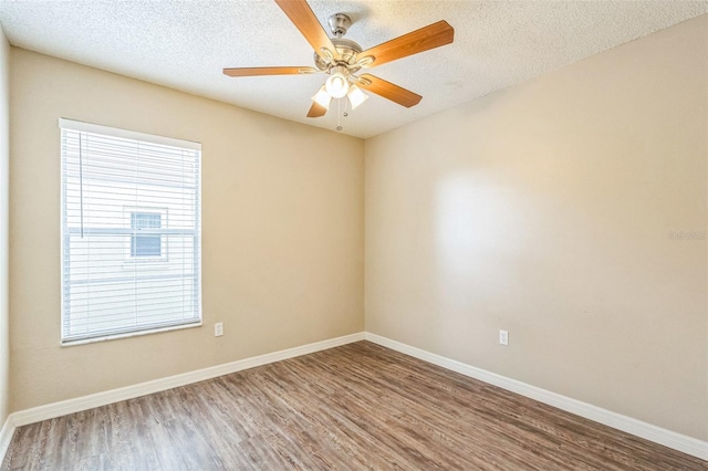 2002 Culpepper Dr, Brandon, FL 33511 - empty room featuring wood finished floors, a textured ceiling, and ceiling fan