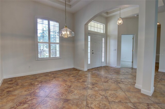 1679 Shadowmoss Cir, Lake Mary, FL 32746 - entrance foyer featuring healthy amount of natural light, arched walkways, and a high ceiling