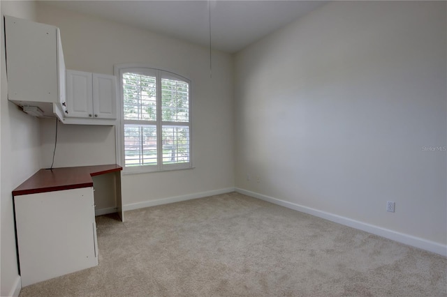 1679 Shadowmoss Cir, Lake Mary, FL 32746 - unfurnished dining area featuring light colored carpet and baseboards