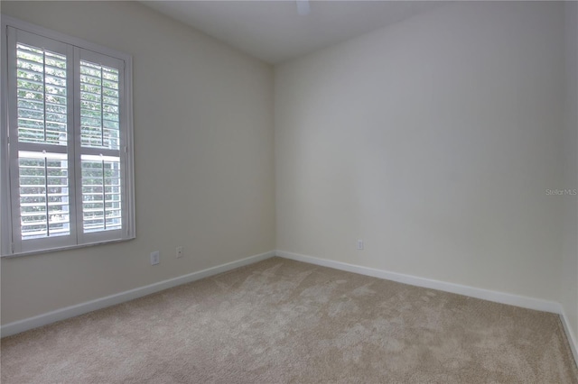1679 Shadowmoss Cir, Lake Mary, FL 32746 - carpeted spare room featuring baseboards