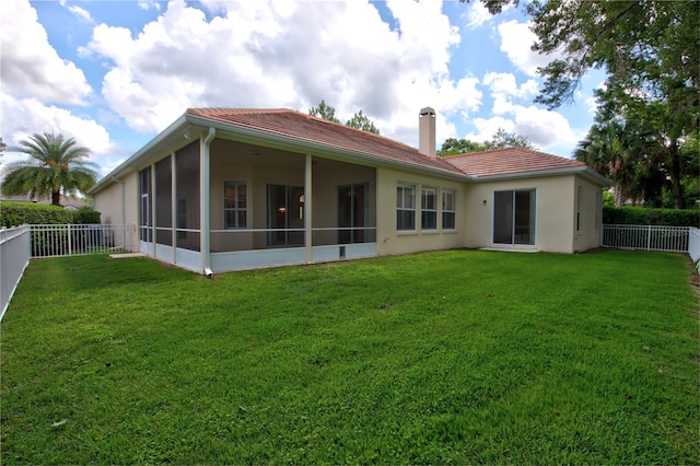 1679 Shadowmoss Cir, Lake Mary, FL 32746 - back of house with a fenced backyard, a sunroom, stucco siding, and a chimney