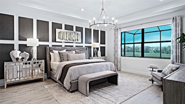 14375 Hammock Oak St, Parrish, FL 34219 - bedroom with ornamental molding, a chandelier, and wood finished floors