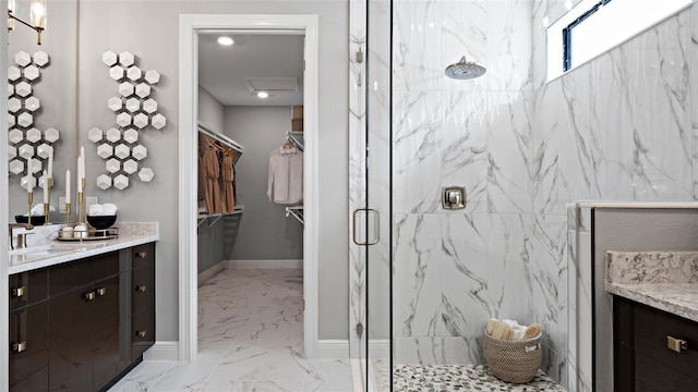 14375 Hammock Oak St, Parrish, FL 34219 - bathroom featuring marble finish flooring, vanity, a marble finish shower, and a spacious closet