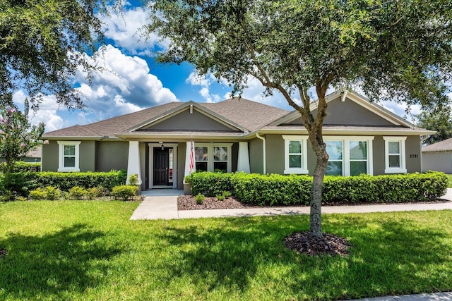 2781 Sand Oak Loop, Apopka, FL 32712 - ranch-style home with a front yard and stucco siding