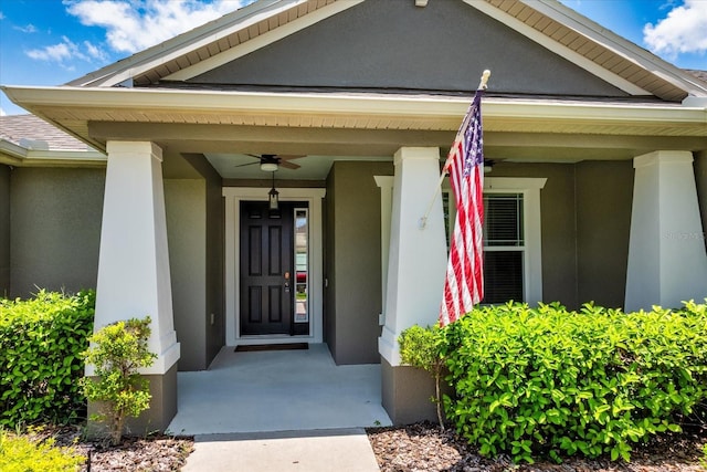 2781 Sand Oak Loop, Apopka, FL 32712 - entrance to property featuring a ceiling fan, stucco siding, and a porch