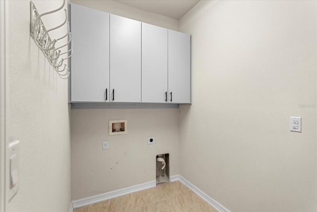 2781 Sand Oak Loop, Apopka, FL 32712 - laundry area featuring cabinet space, electric dryer hookup, hookup for a washing machine, and light tile patterned floors