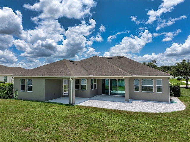 2781 Sand Oak Loop, Apopka, FL 32712 - back of house with stucco siding, a patio, and a shingled roof