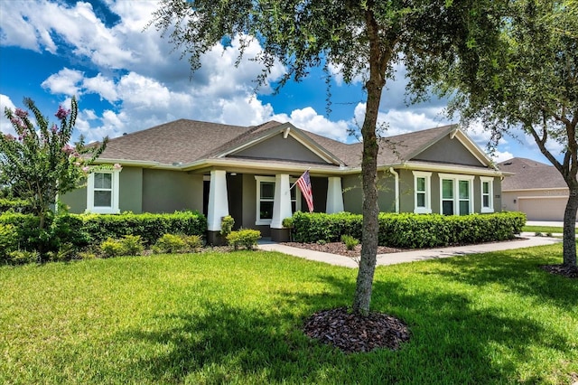 2781 Sand Oak Loop, Apopka, FL 32712 - view of front of property with stucco siding, a front lawn, and a garage