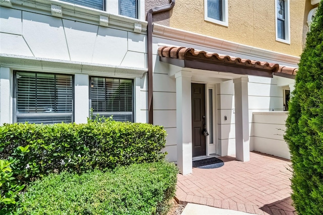 4244 Messina Dr, Lake Mary, FL 32746 - entrance to property featuring stucco siding