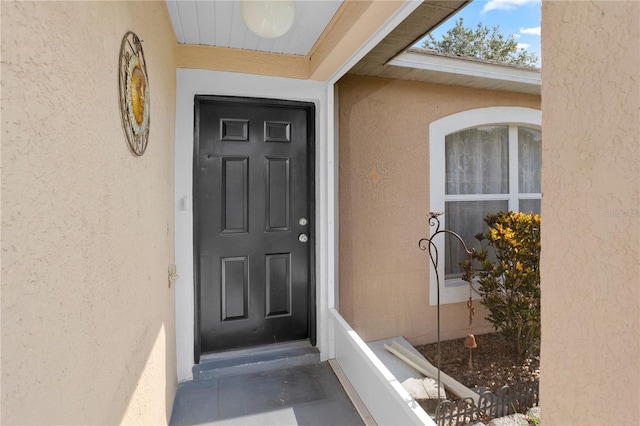 144 Fort Smith Blvd, Deltona, FL 32738 - entrance to property featuring stucco siding