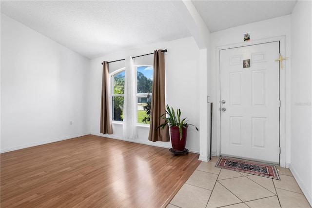 144 Fort Smith Blvd, Deltona, FL 32738 - foyer with light wood-type flooring and baseboards