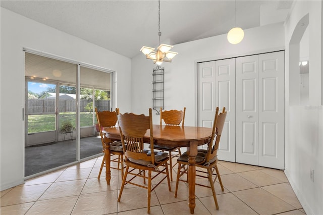 144 Fort Smith Blvd, Deltona, FL 32738 - dining space with light tile patterned floors and a chandelier