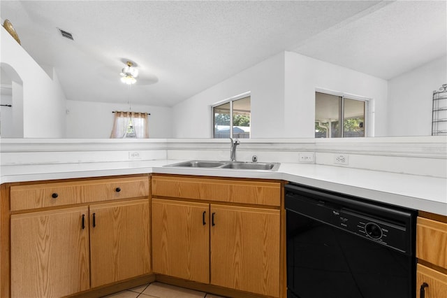 144 Fort Smith Blvd, Deltona, FL 32738 - kitchen with dishwasher, light countertops, a textured ceiling, and light tile patterned floors