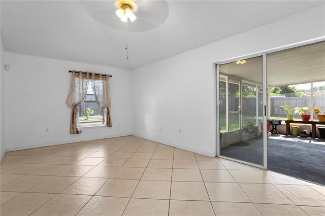 144 Fort Smith Blvd, Deltona, FL 32738 - tiled spare room with ceiling fan and plenty of natural light