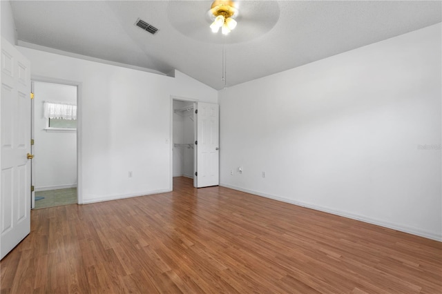144 Fort Smith Blvd, Deltona, FL 32738 - unfurnished room with ceiling fan, vaulted ceiling, and light wood-type flooring