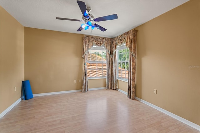 9128 Phillips Grove Ter, Orlando, FL 32836 - empty room featuring ceiling fan and light wood-type flooring